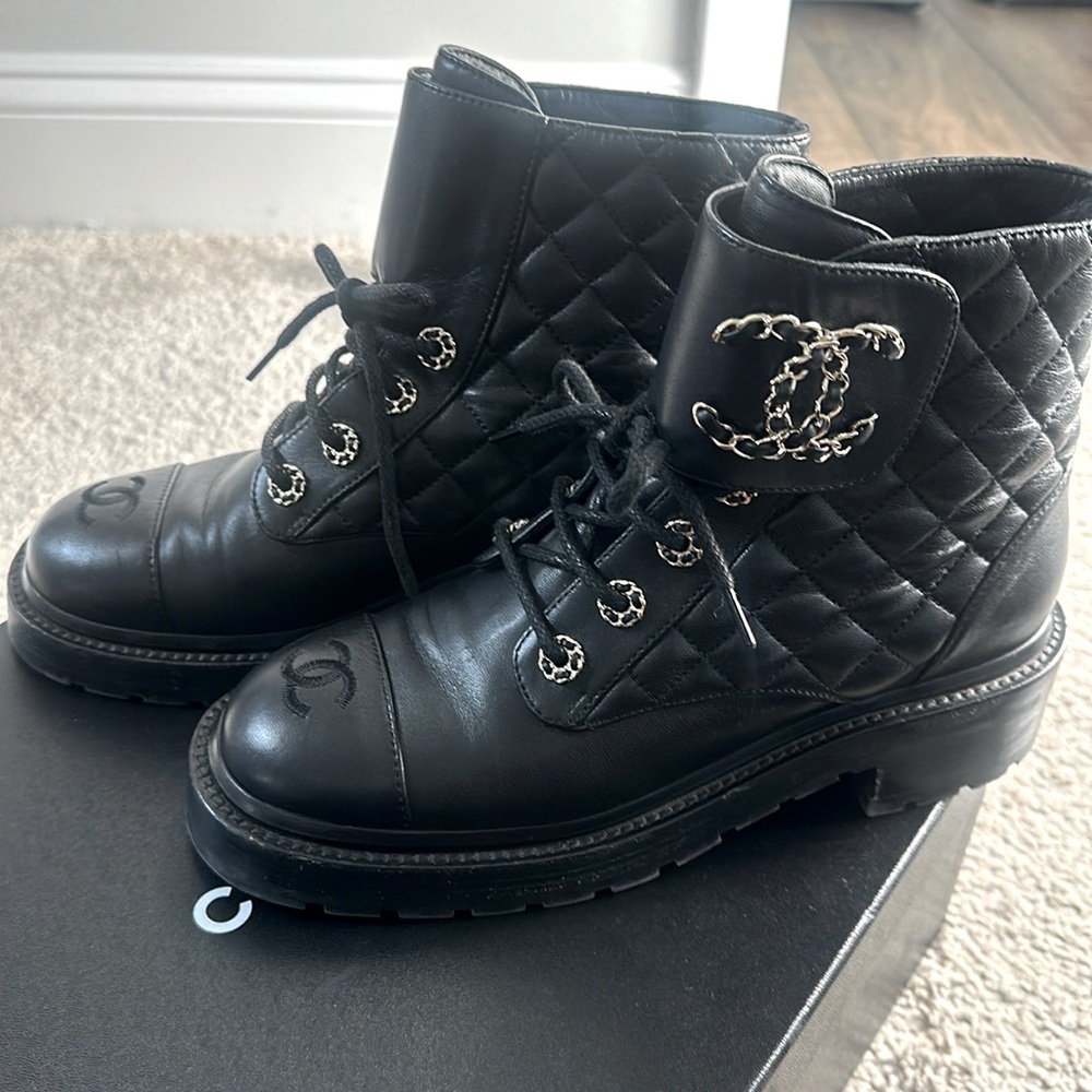 These are authentic Chanel Goatskin Calfskin Quilted Lace Up Combat boots.